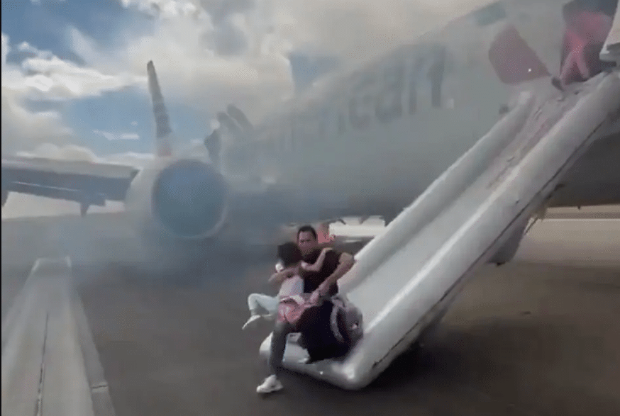 Passengers Evacuated After Plane Catches Fire