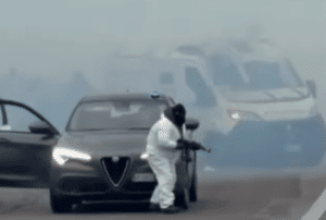 Armed Gang Bombs Armored Van on Highway