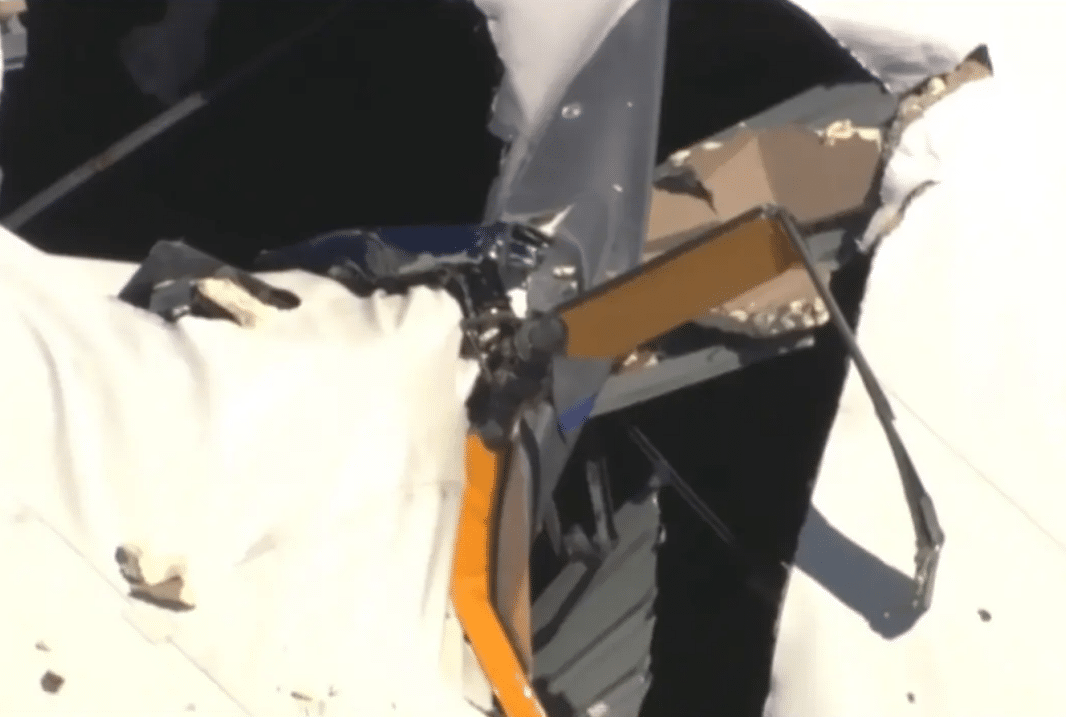 Two Killed After Helicopter Crashes Into Building