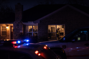 Police at Residence Via AI Image