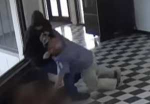 Principal Tackles Gunman in School Lobby