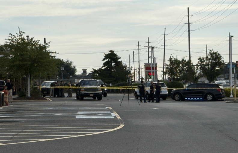 Man Shot Dead in Store Parking Lot